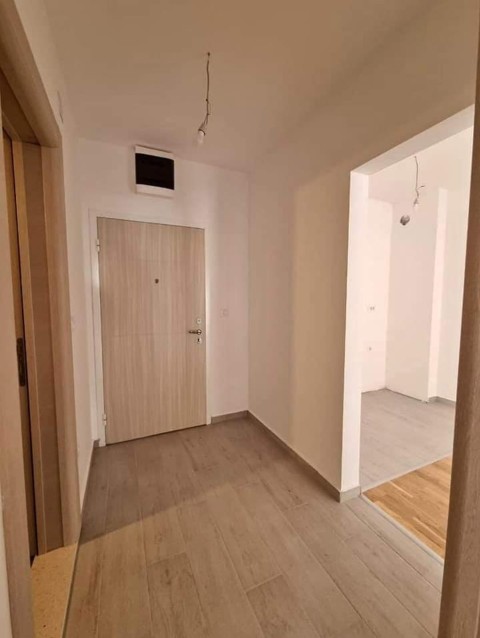 Apartment for sale in Budva in a new building with elevator and covered parking